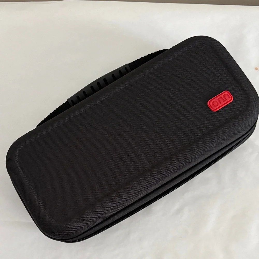 Onn. Hard Shell Carrying Case for the Nintendo Switch or Switch OLED New black